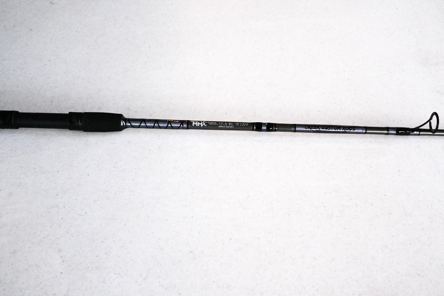 Spinning Rod - Graphite, Silver, and Black