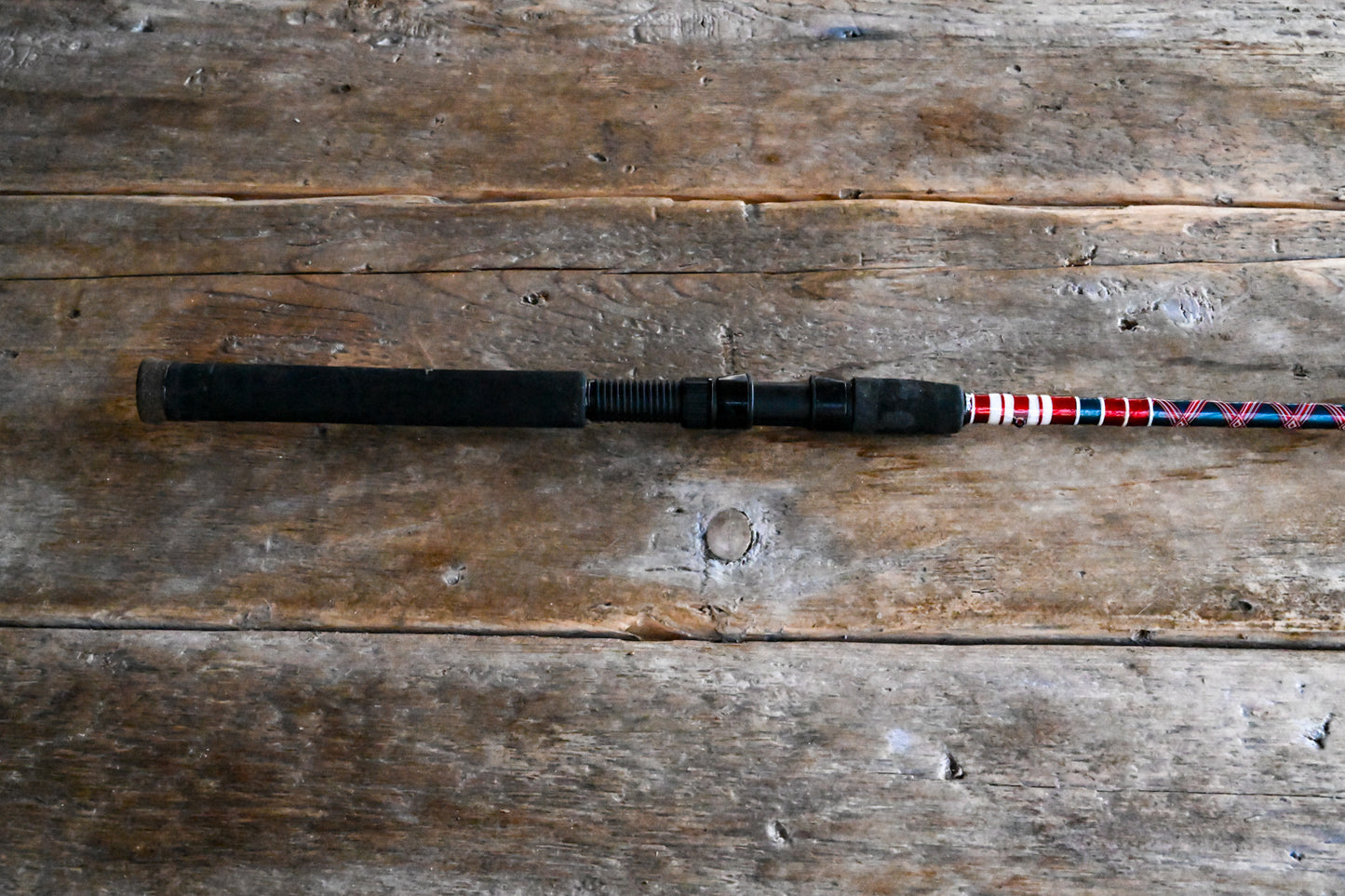 Spinning Rod - Red, White, and Metallic Blue